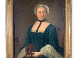 portrait of a woman in a blue dress holding a book