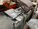 an image of a machine that is sitting in a warehouse