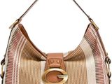 a close up of a purse with a handle on a white background