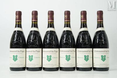 six bottles of wine are lined up in a row on a table