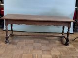 a table that is sitting on a hard wood floor