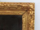 a picture of a gold frame with a black background