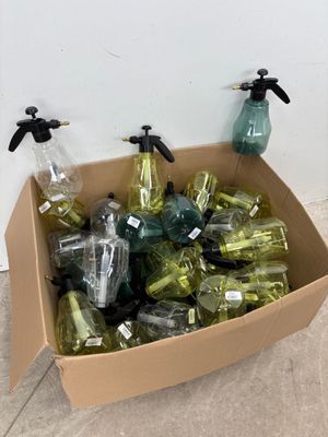 a cardboard box filled with bottles and bottles of water