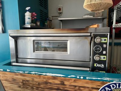 an image of a toaster oven sitting on top of a counter