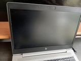 a laptop computer that is sitting on a table
