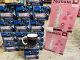 de nombreuses tasses à l'effigie de Batman exposées dans un magasin