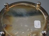 an image of a close up of a watch on a table