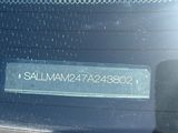 a sign on the back window of a car
