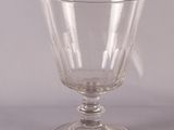 clear glass goblet sitting on top of a white table