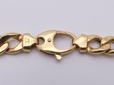 an image of a gold chain bracelet on a white background