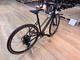a bike that is sitting on a stand in a store