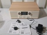a radio that is sitting on a table next to a charger
