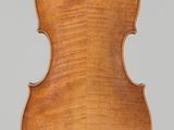 an old violin with a wooden back and a long neck