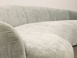 an image of a couch and ottoman in a living room
