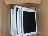 a cardboard box with a bunch of electronic devices inside of it