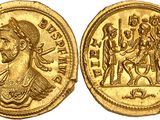 a gold coin with an image of a man and a woman on it