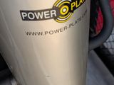 an image of a silver and black motorcycle with a power plate sticker on it