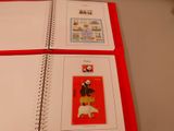 a red binder with a picture of a polar bear and a polar bear on it