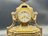 a clock that is sitting on top of a table