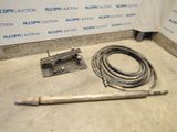 an image of a pipe and a hose on the floor