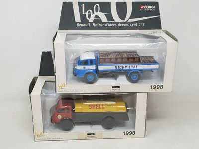 two toy trucks that are in a box