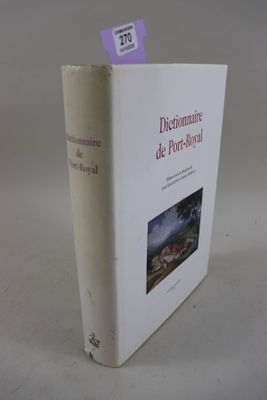 la couverture d'un livre sur laquelle est collé un autocollant