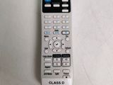 a close up of a remote control on a table