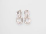 a pair of white gold and diamond earrings