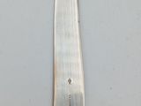a knife that is sitting on top of a table