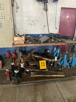 a picture of a workbench in a garage with tools on it
