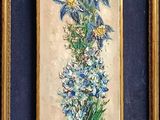 painting of a vase with blue flowers in it on a wall