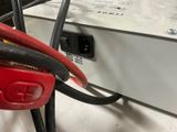 a red and black wire connected to a power supply