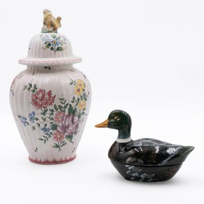 two vases sitting next to each other on a white surface