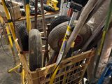 a lot of tools in a basket on the floor
