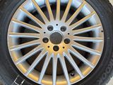 a close up of a tire on a car tire on a floor