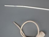 a picture of a pipe and a tube on a table