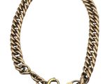 a close up of a bracelet with a heart on it