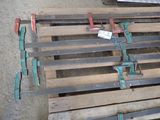 several pieces of wood are stacked on top of each other