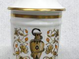 an image of a white and gold coffee canisterr