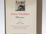 an old book with a picture of a man in glasses on it