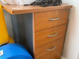 a desk with a printer and a blue hose on it