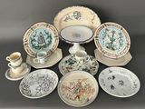 many plates and cups and saucers on the table