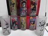 a lot of star wars drinking glasses on the table