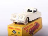 a toy car sitting on top of a box on a table