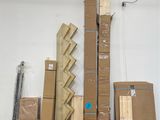 many cardboard boxes stacked on top of each other in a warehouse