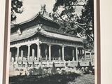 an old photo of a building in the middle of a book