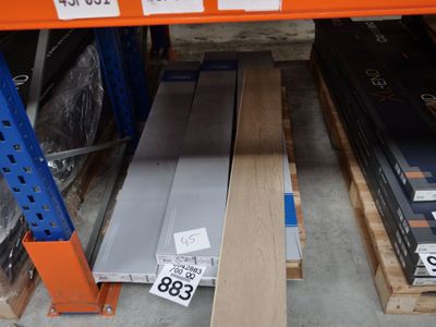 many different types of wood on the shelves in the store