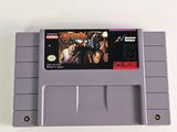 an image of a nintendo game cartridge with a picture of a man holding a gun