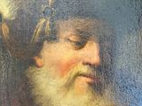 painting of a bearded man with a feather on his head
