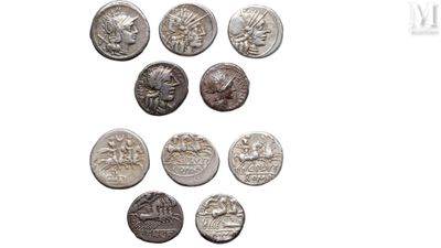 a close up of a bunch of coins on a white surface
